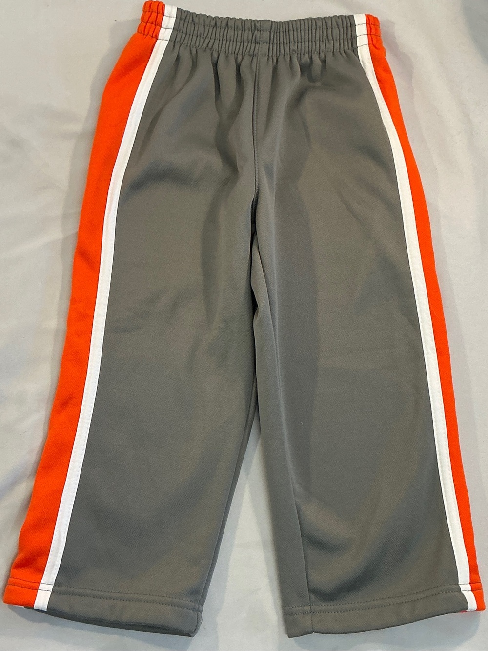 Puma Grey fleece/plush lined Joggers with Orange and White Side Stripes